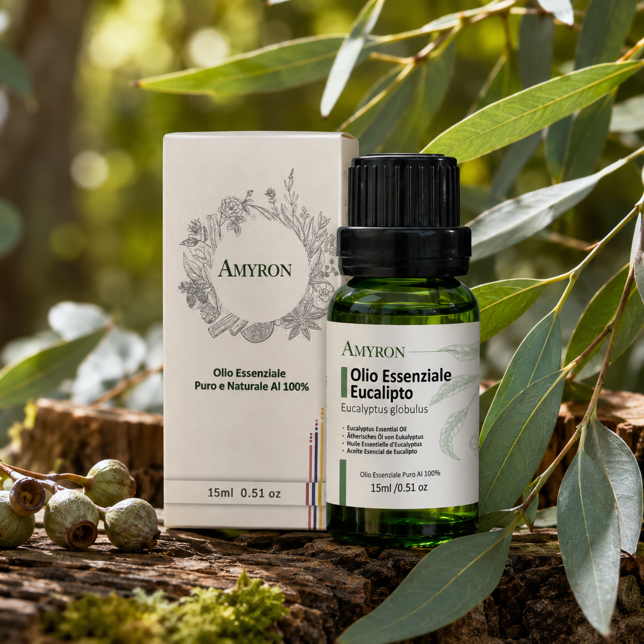 Olio essenziale di eucalipto Amyron con confezione, foglie e frutti di Eucalyptus globulus