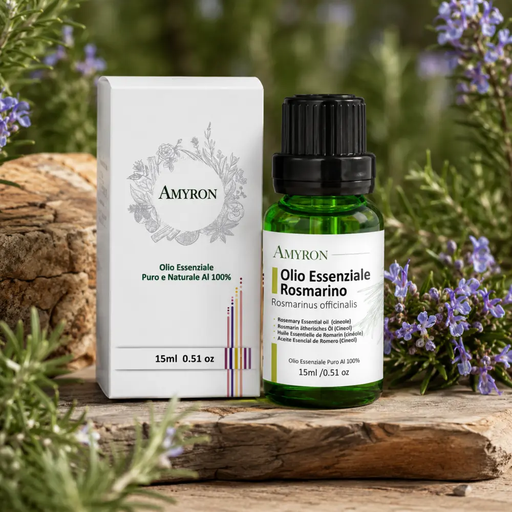 Confezione e flacone AMYRON da 15 ml di olio essenziale di rosmarino cineolo tra rami fioriti