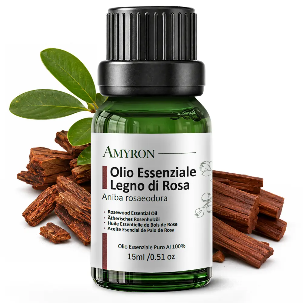 Flacone AMYRON da 15 ml di olio essenziale di Legno di Rosa con legno e foglie di Aniba rosaeodora